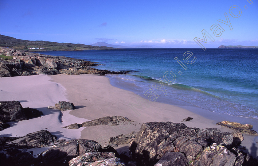 Sandy-Beach-on-Inishturk 
 The cove of Tranaun, Inishturk Island, Co Mayo, Ireland. 
 Keywords: Irish, islands, shores, shorelines, coasts, coastlines, coastal, atlantic, seas, oceans, outdoors, scenes, landscapes, scenery, beach, beaches, sand, sandy, coves, white