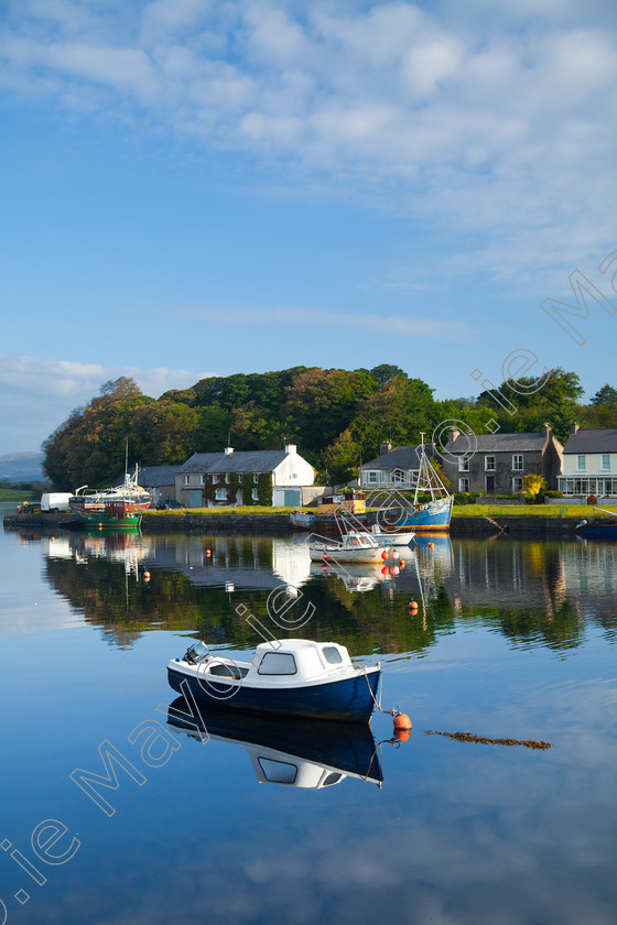 Newport 
 Reflection of Newport harbour, Co Mayo, Ireland. 
 Keywords: Irish, coasts, coastlines, coastal, atlantic, outdoors, scenery, fishing, boats, scenes, wooden, harbours, quays, piers, moored, moorings, villages, towns, waterfront, buildings, houses, homes