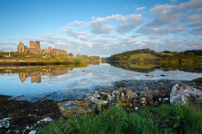 Burrishoole-Abbey 
 Evening over Burrishoole Abbey, Clew Bay, Co Mayo, Ireland. 
 Keywords: Irish, abbeys, church, churches, sites, history, historic, heritage, buildings, ruins, ruined, old, stone, religious, religion, banks, outdoors, scenery, scenes, christian, catholic, reflections, reflected, calm, tranquil, shore, shoreline, coasts, coastal, coastlines