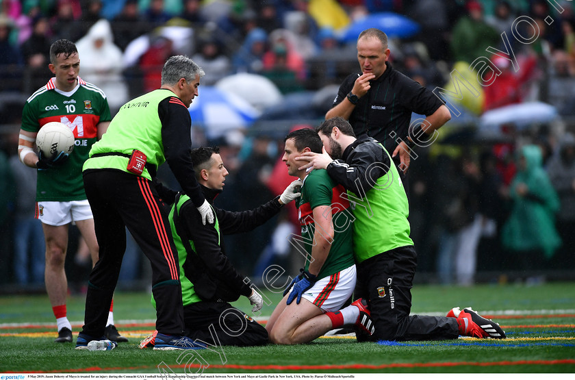 1696496 
 5 May 2019; Jason Doherty of Mayo is treated for an injury during the Connacht GAA Football Senior Championship Quarter-Final match between New York and Mayo at Gaelic Park in New York, USA. Photo by Piaras Ó Mídheach/Sportsfile 
 Keywords: GAA, Football, ny, nyc, bronx, Manhattan, mayococo