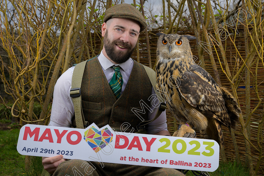 MayoDay2023-1674 
 Mayo Day 29th of April to celebrate all things Mayo, with the flagship event taking place in Ballina for the first time as part of the Ballina 2023 celebrations. Mount Falcon hotel falconer Daniel Gibbons with "Rascal" the eurasian eagle owl, one of the many birds of prey that will be on display for Mayo Day. Pic: Michael Mc Laughlin