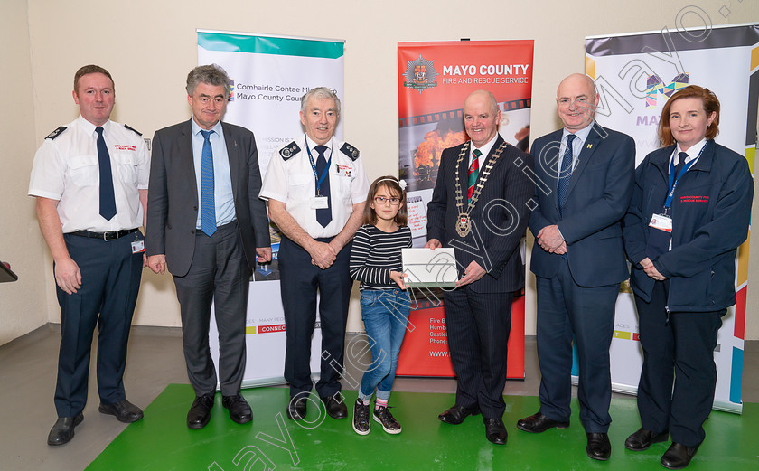 Photo-0006-captioned 
 Pictured at Mayo County Fire Service are winners of the Fire Safety Awareness Competition for National School pupils. From left are Donal Reilly Acting Chief Fire Officer, Mayo Fire Service, John Condon, Director of Services, Seamus Murphy, Chief Fire Officer, Mayo Fire Service, Sarah Raba, Breaffy NS, Ballina, Cllr Blackie Gavin, Cathaoirleach of Mayo County Council, Peter Hynes, Chief Executive of Mayo County Council and Aileen O'Connell, Senior Acting Chief Fire Officer, Mayo Fire Service. PHOTO: John Mee Photography