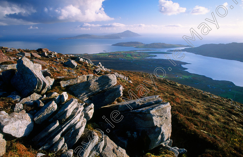 Clare-Island-and-Clew-Bay 
 View from Corraun mountain to Clare Island, Co Mayo, Ireland. 
 Keywords: coast, coastal, coastlines, landscapes, irish, ocean, atlantic, sea, mountains, summits, outdoors, scenery, scenes, hills, views, rocks, rocky