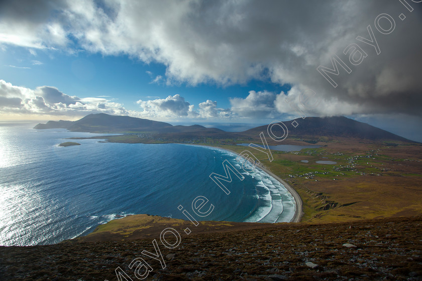 Keel-Blue-Flag-Beach-Achill-(0001) 
 View over Achill Island from the Menawn Cliffs, Co Mayo, Ireland. 
 Keywords: atlantic, coastal, coastlines, coasts, heights, hills, Irish, islands, Menaun, outdoors, scenes, scenery, landscapes, views, viewpoints