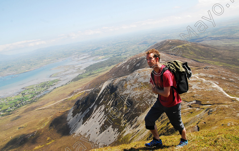 Croaghpatrick-0365)0106[0001] 
 'The Penultimate Climb', Matt Loughrey of Croaghpatrick365 on his way up the Mayo mountain on the penultimate day. Matt's personal challenge in climbing Croagh Patrick 365 days consectively will be completed tomorrow saturday 4th of June. The event has gathered emormous profile from facebook and has over 3700 followers. Donations from the event which have reached over €30,000 arein aid of St Vincent De Paul.

Pic Conor McKeown

more info on croaghpatrick365.com

Pic Conor McKeown

Pic Conor McKeown