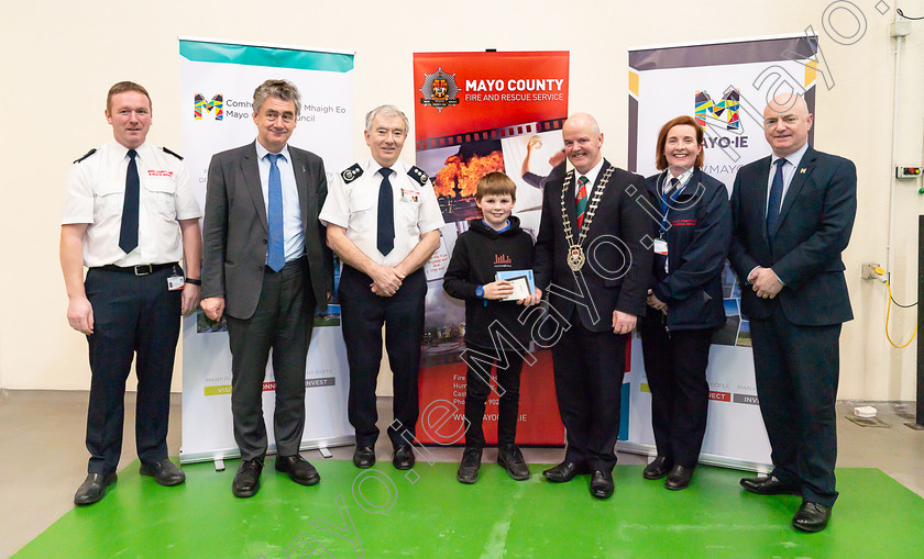 Photo-0011-captioned 
 Pictured at Mayo County Fire Service are winners of the Fire Safety Awareness Competition for National School pupils.

From left are Donal Reilly, Acting Chief Fire Officer, Mayo Fire Service, John Condon, Director of Services, Seamus Murphy, Chief Fire Officer, Mayo Fire Service, Oisín Noone, Foxford NS, Foxford, Cllr Blackie Gavin, Cathaoirleach of Mayo County Council, Aileen O'Connell, Senior Acting Chief Fire Officer, Mayo Fire Service, Peter Hynes, Chief Executive of Mayo County Council. PHOTO: John Mee Photography